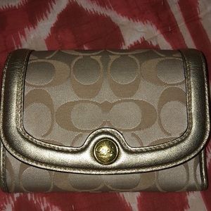 Gold coach wallet. Great condition